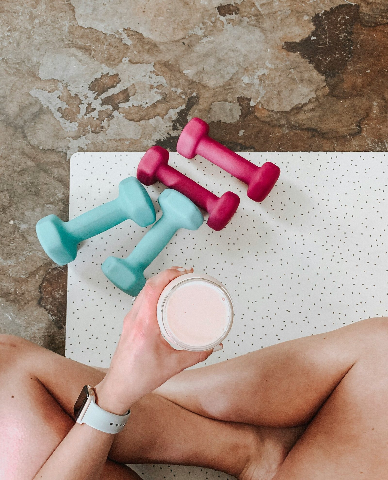 person holding white liquid